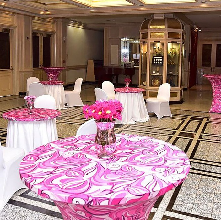 Pink and white spandex table covers with pink flowers in a vase - eccessories by Ellen www.eccessoriesbyellen.com