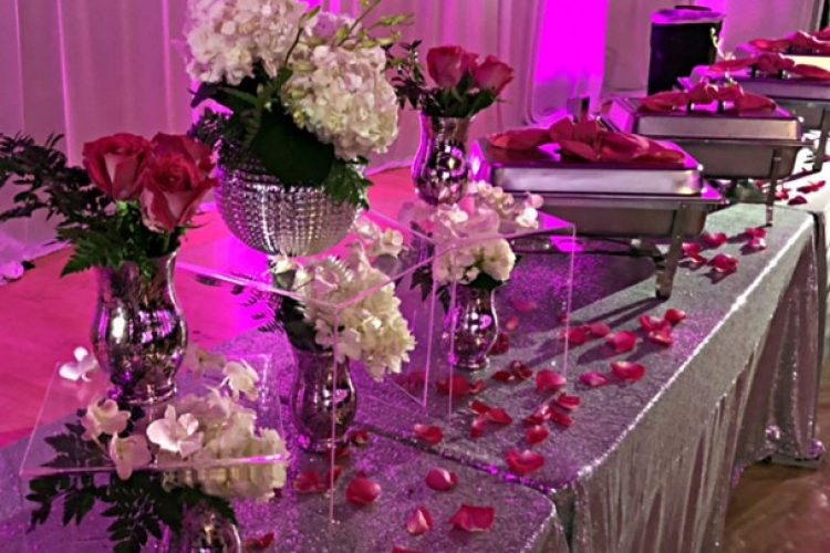 sparkling silver table cloth with red and white flowers in vases - eccessories by Ellen www.eccessoriesbyellen.com